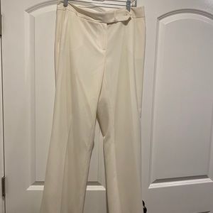 Cream straight legged trousers